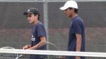 Four doubles lifts Neuqua Valley as the duo walks off the court.