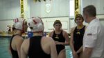 Captains meet prior to the Naperville Central vs Metea Valley girls water polo match