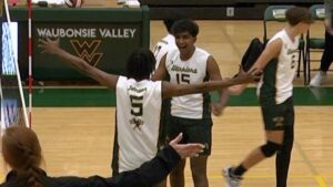 Micheal Johnson and Waubonsie celebrate the point after the kick save.