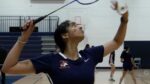 Naperville North badminton player warms up.