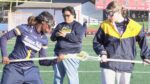 Neuqua Valley girls lacrosse players warm up before taking on Naperville Central.