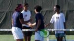 Metea Valley boys tennis players shake hands with Naperville North opponents