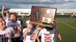 Benet Academy with girls lacrosse sectional plaque
