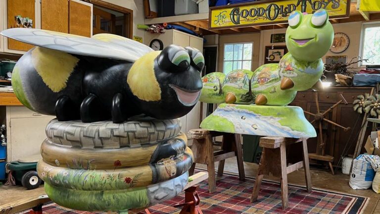 The bee and caterpillar sculpture painted by Marianne Lisson Kuhn.