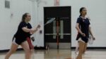 Kotryna Petreikyte and Abby Wang warmup for Naperville North badminton before the sectional.