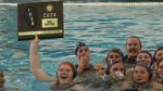 Naperville North with the girls water polo sectional plaque