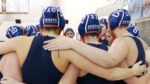 Naperville North girls water polo huddled up