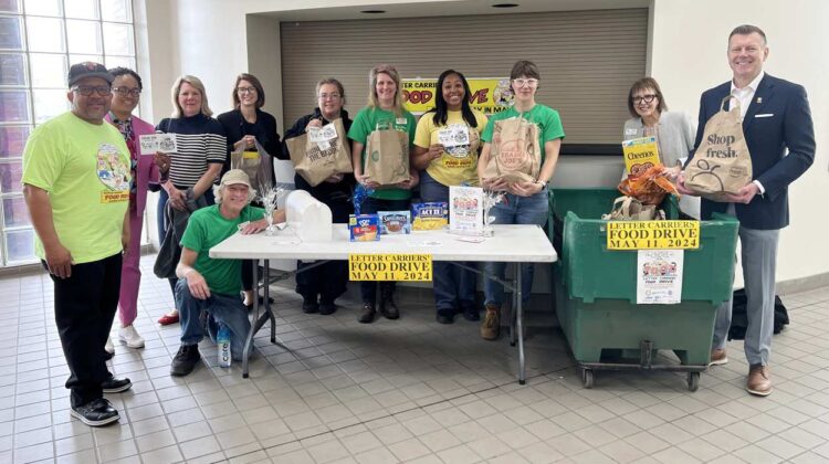 Loaves & Fishes staff, postal carriers, and Scott Wehrli.