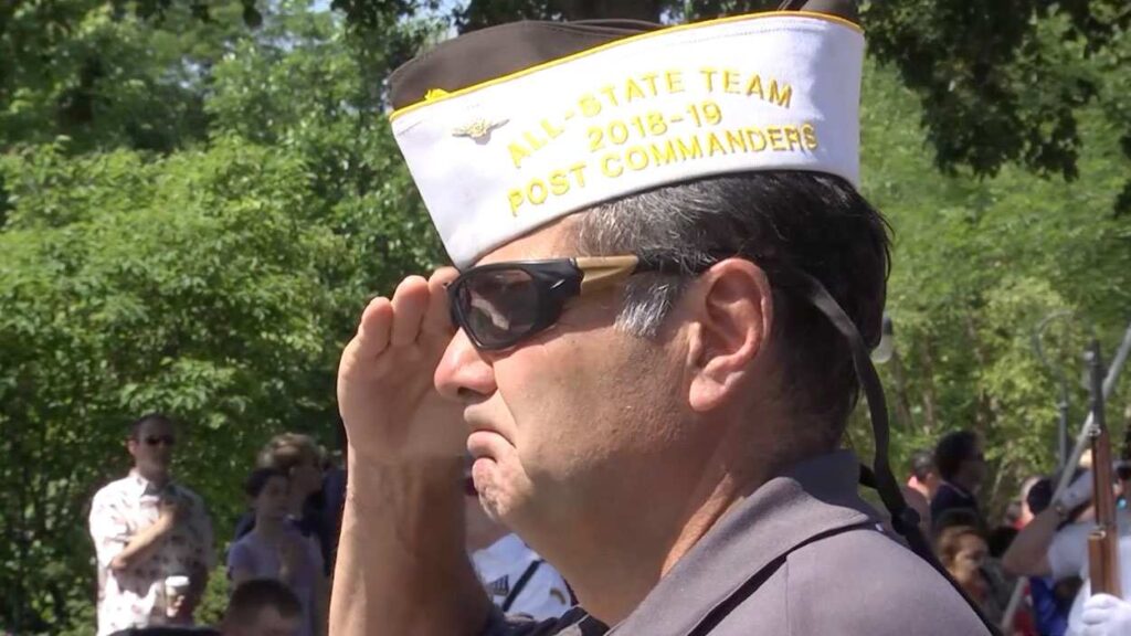 Veteran saluting at 2023 Memorial Day Parade in Naperville