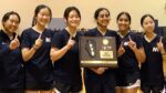 Neuqua Valley badminton celebrates winning the IHSA Sectional.