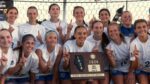 St. Charles North girls soccer celebrates with the Super Sectionals plaque.