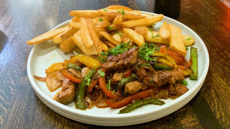 Steak, peppers and fries at AltaVida in downtown Naperville