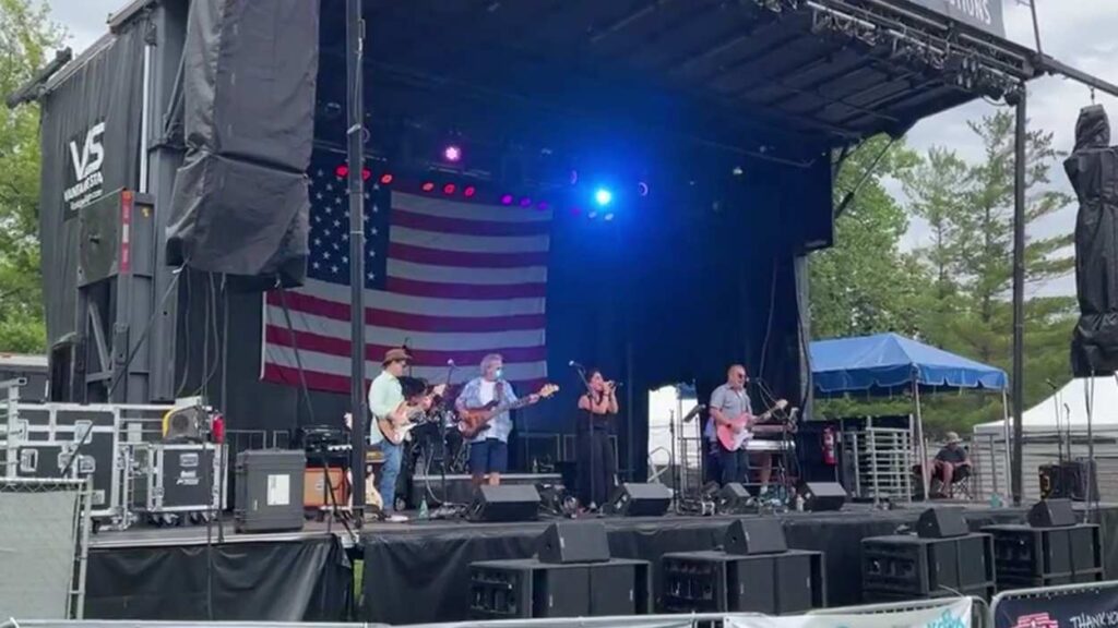 Band performing on stage at Naperville Salute
