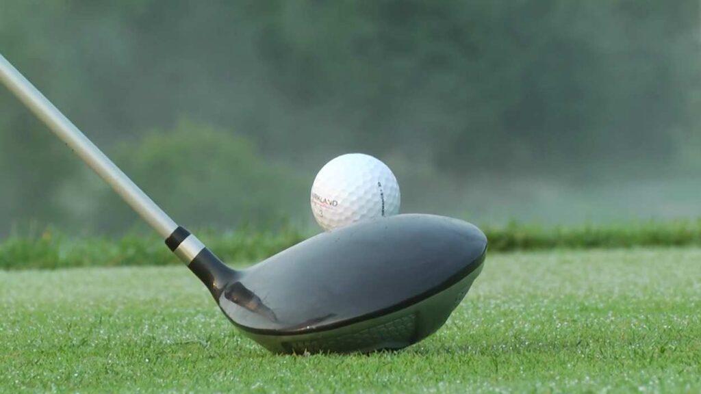 Close up of golf club and golf ball on tee at Naperville Park District's Springbrook Golf Course