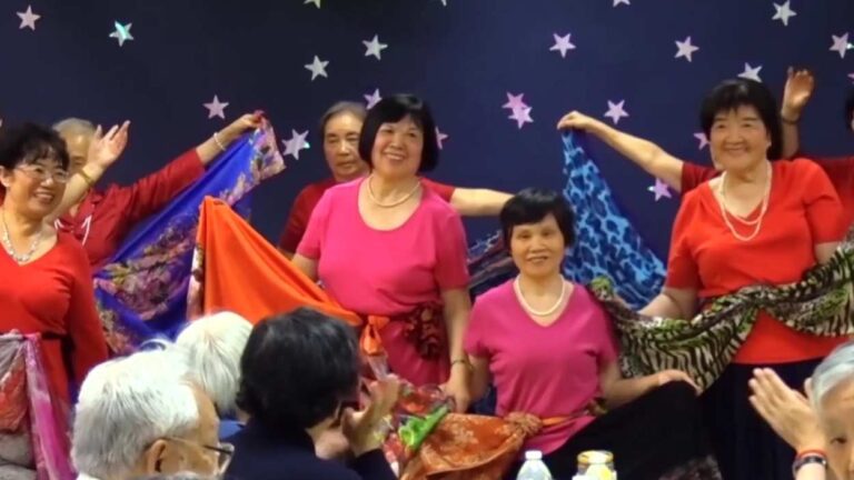 Women performing on stage at Moon Festival at Pacifica Square