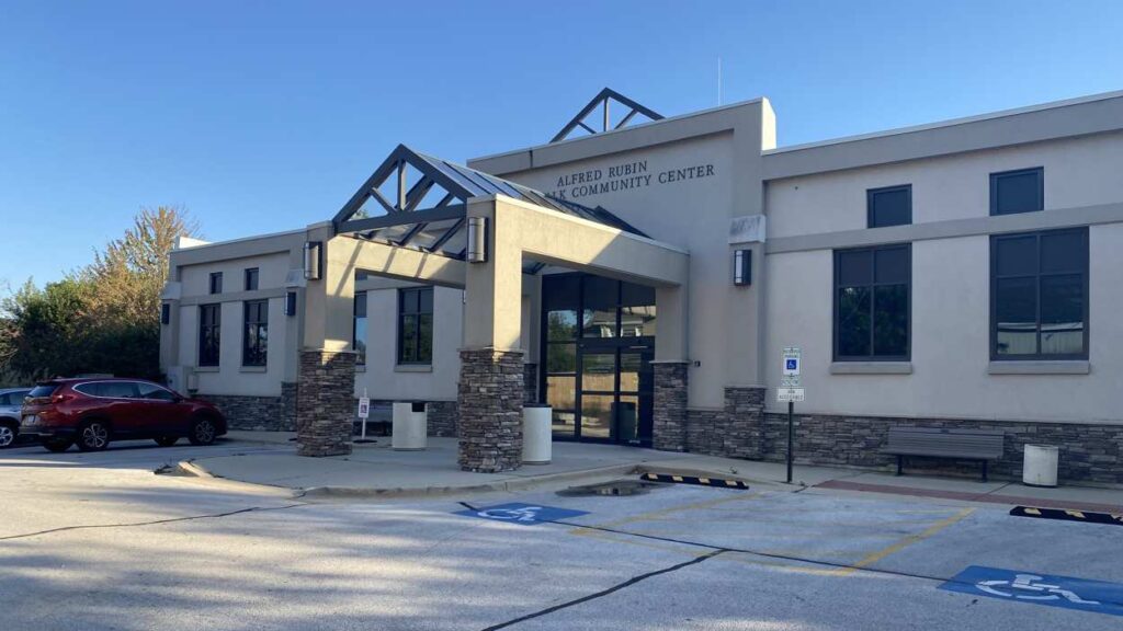 Alfred Rubin Riverwalk Community Center with ADA parking spots in front