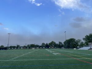 Dust storm visible in distance over Knoch Park area in Naperville