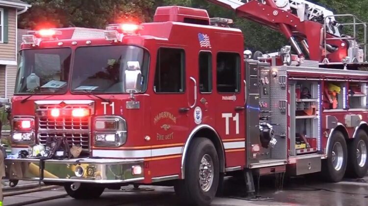 Fire causes $300K in damage and displaces family on Syracuse Avenue. Close up a fire truck