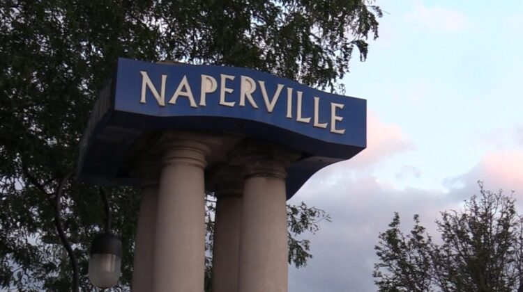 Close up of Naperville sign for story about global leaders visiting Naperville