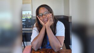 A picture of the missing woman Sinmi Abosede smiling. The Naperville woman remains missing.