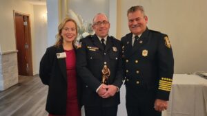 George Winckler award winner Philip Carmody with CAPS chair and fire chief