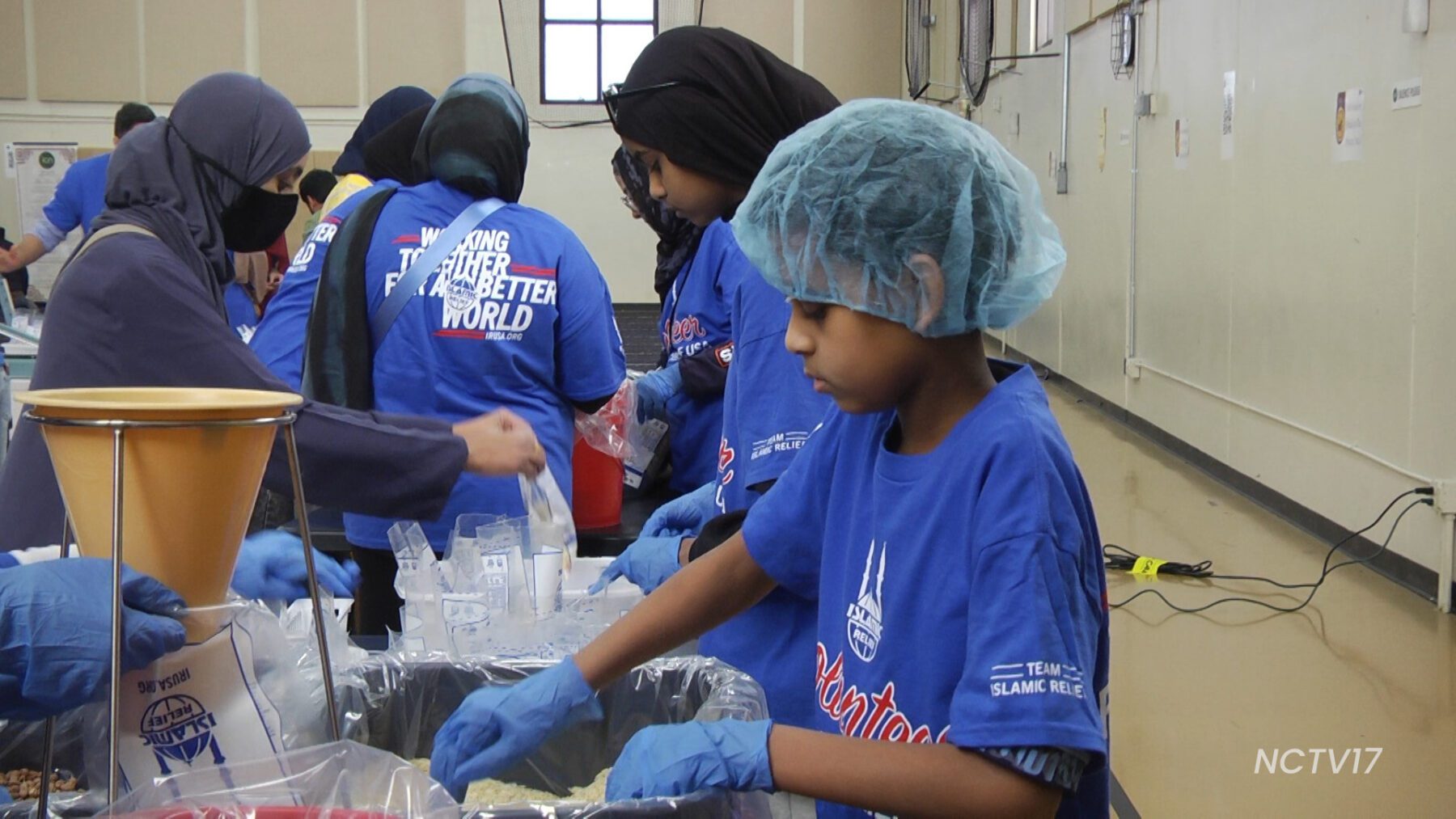 Islamic Center of Naperville Youth gives back with Ramadan food packing event